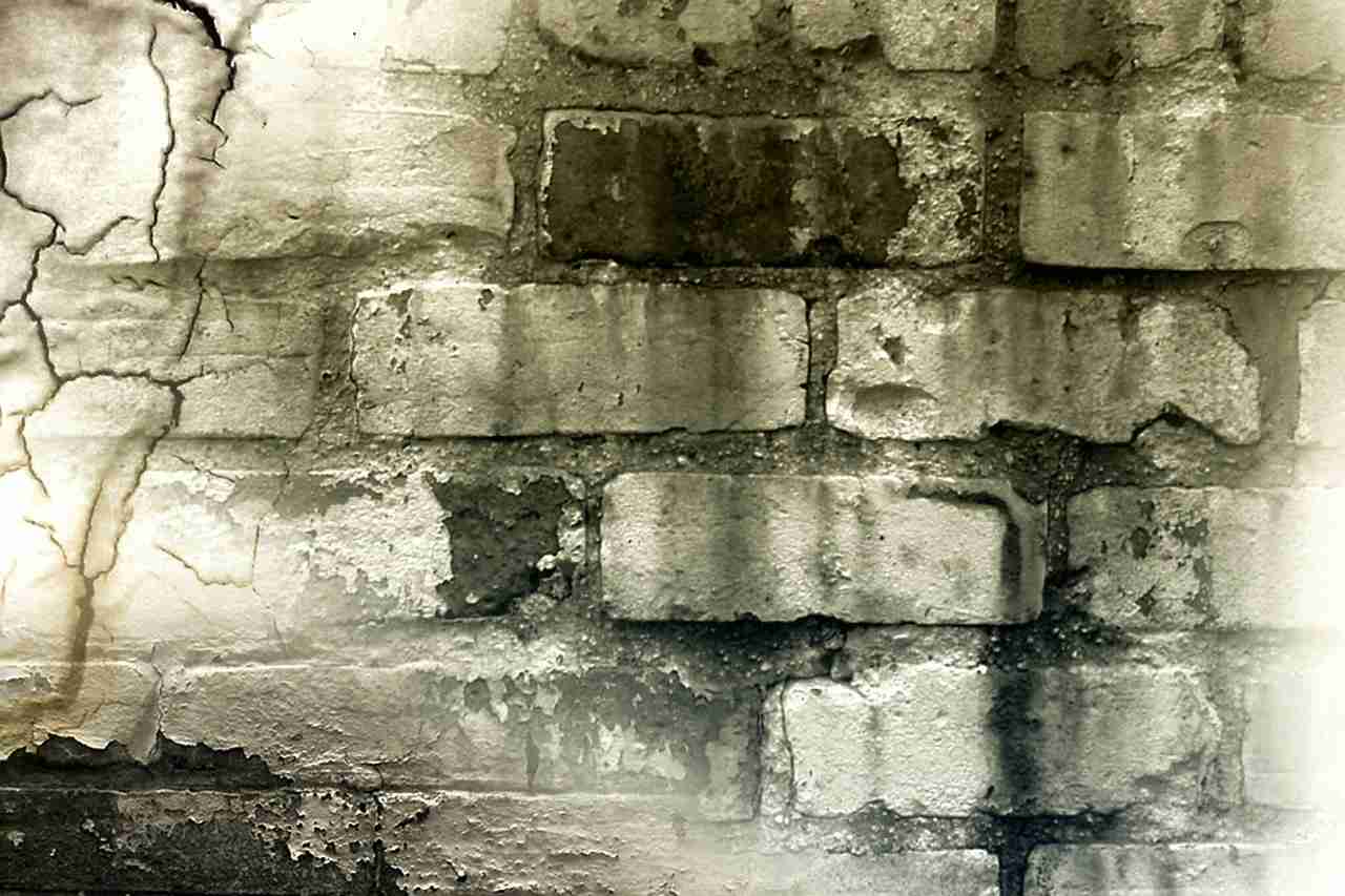 fissures mur pierre