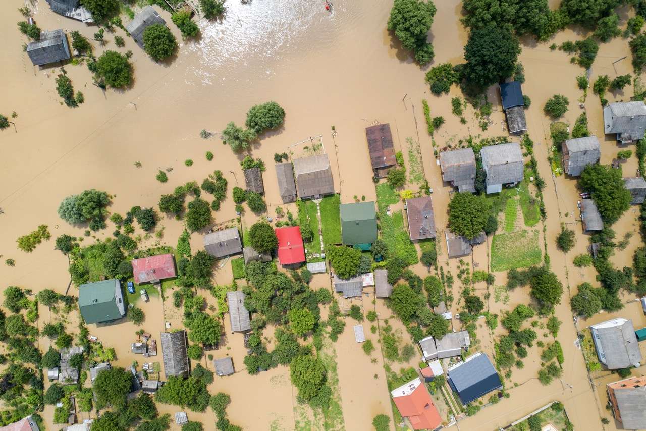 Aerial view of flooded houses with dirty water of Dnister river in Halych town, western Ukraine.